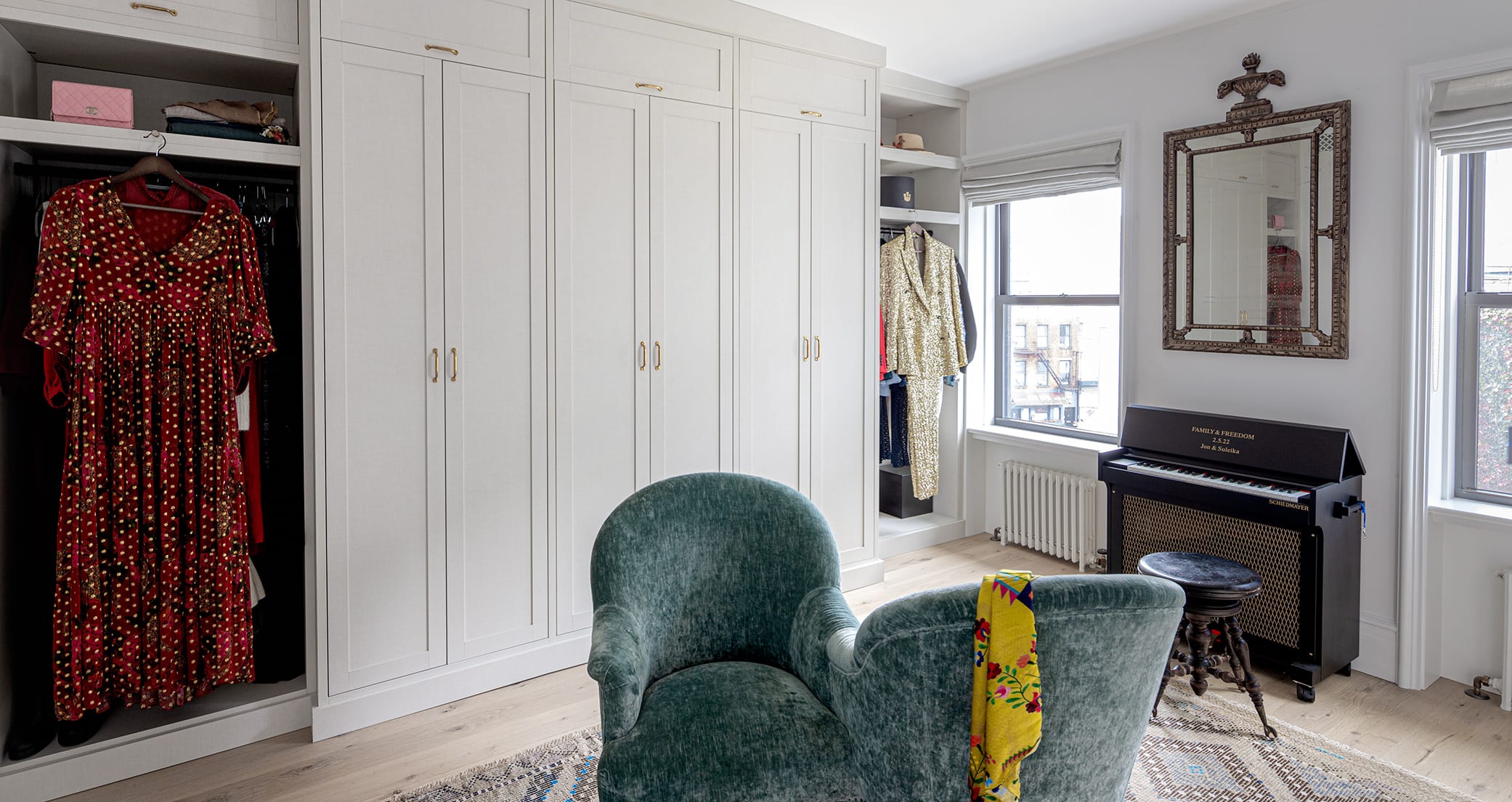 Closet designed for couple, Jon Batiste and Suleika Jaouad with custom dressers, shelving and cabinets by California Closets
